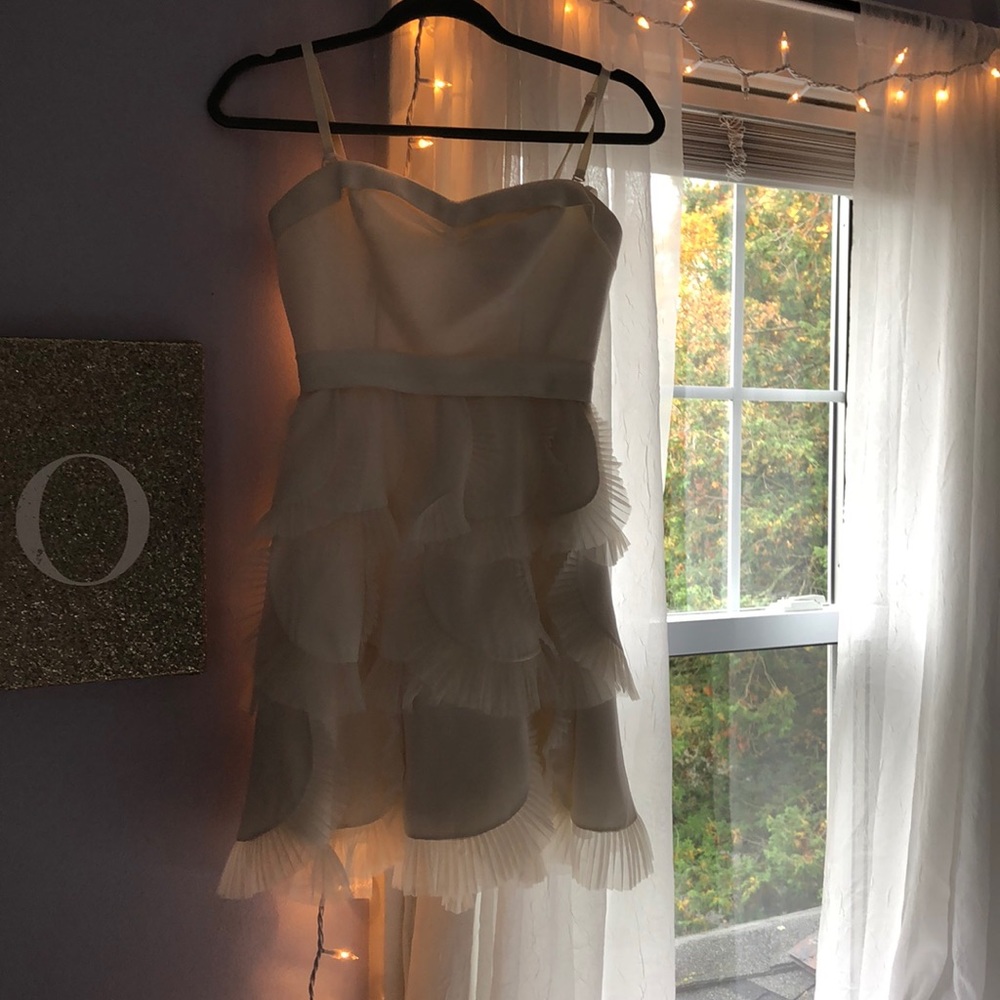BCBG white ruffle dress. Worn once, size 0